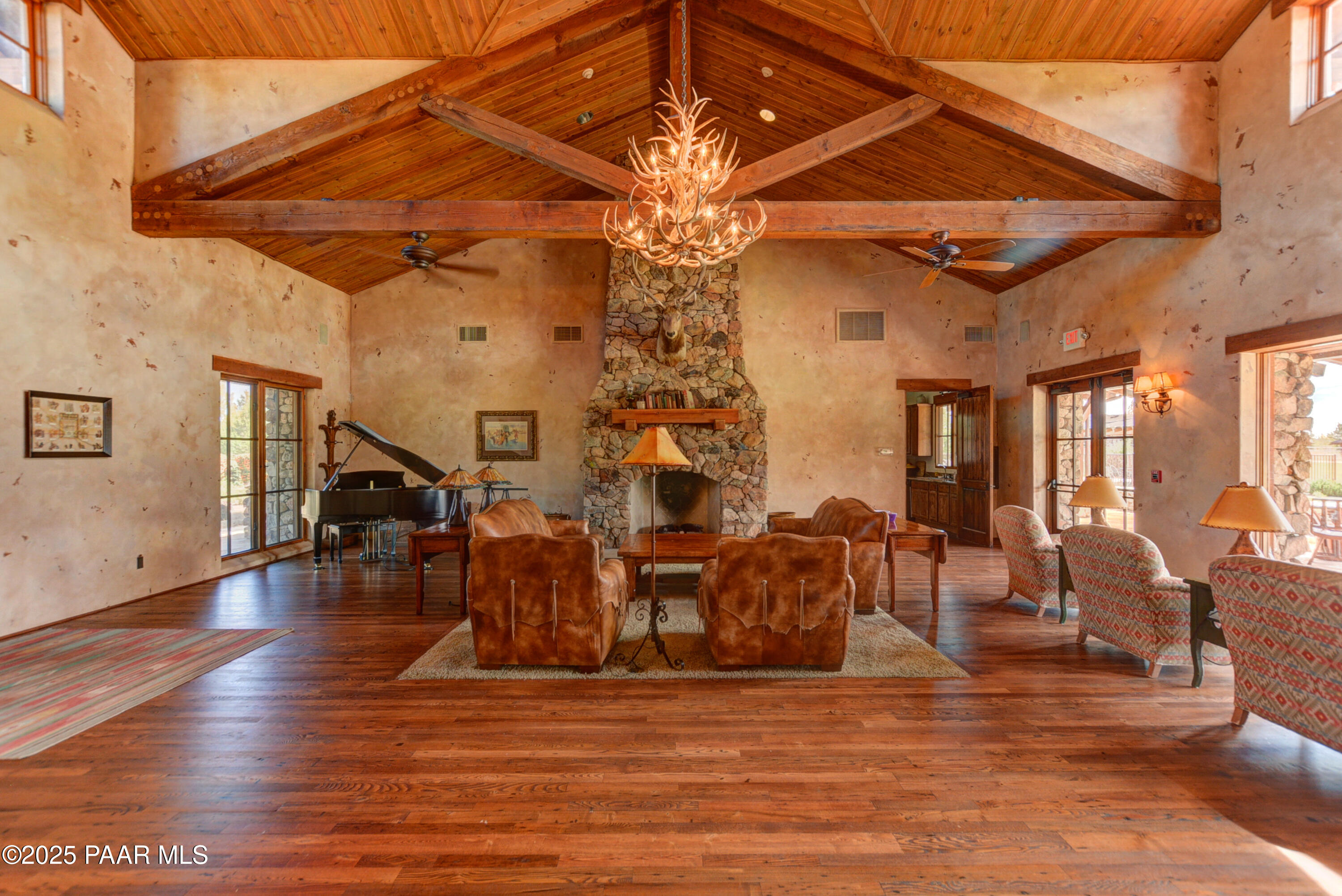 9875 North Equine Road Prescott, AZ 86305 - Photo 14 of 24 a living room with lots of furniture and wooden floor
