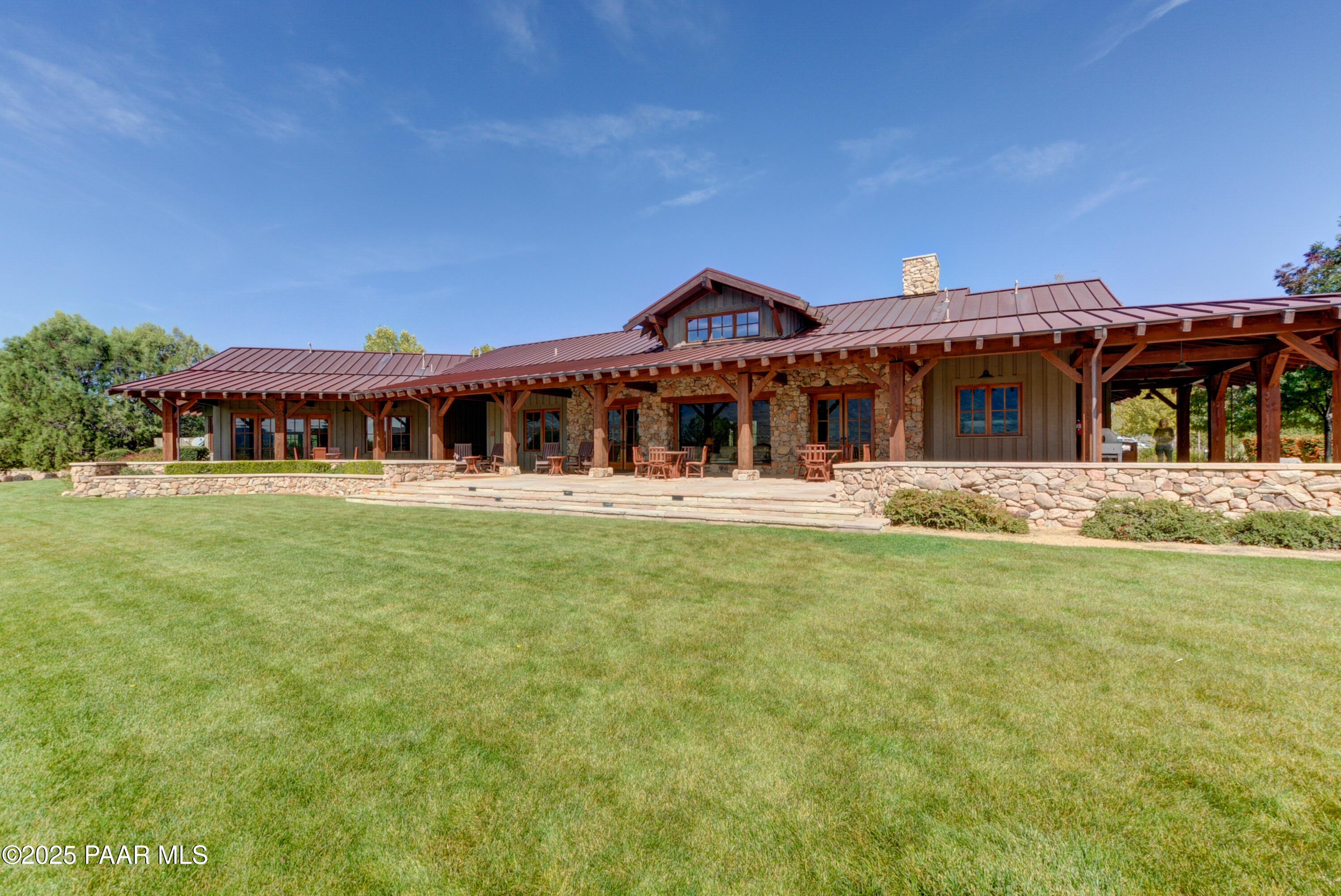 9875 North Equine Road Prescott, AZ 86305 - Photo 16 of 24 a view of a house with a yard balcony and seating area