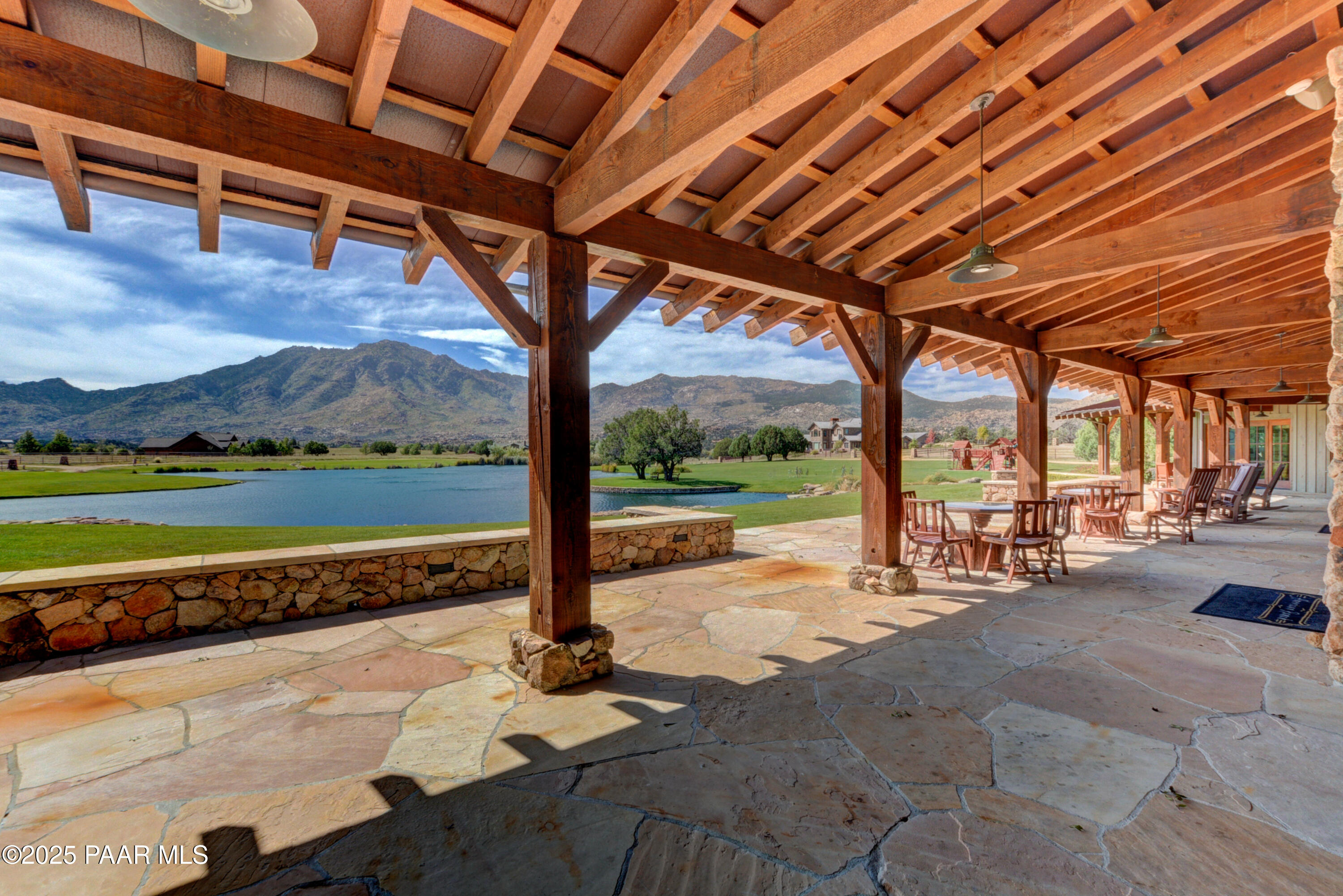 9875 North Equine Road Prescott, AZ 86305 - Photo 17 of 24 a view of a swimming pool with a patio