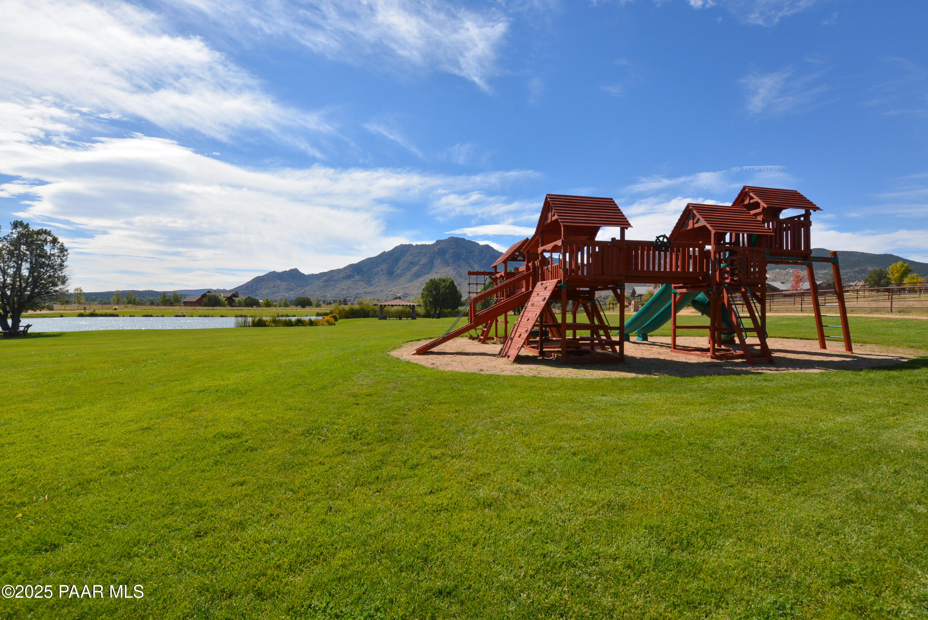 9875 North Equine Road Prescott, AZ 86305 - Photo 19 of 24 a view of a lake with a slide