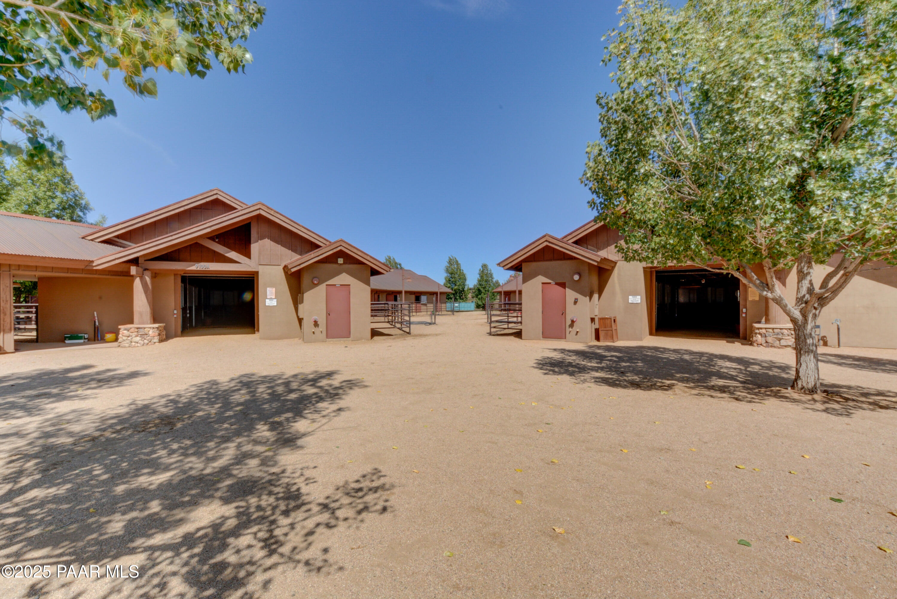 9875 North Equine Road Prescott, AZ 86305 - Photo 23 of 24 a front view of a house with a yard and garage