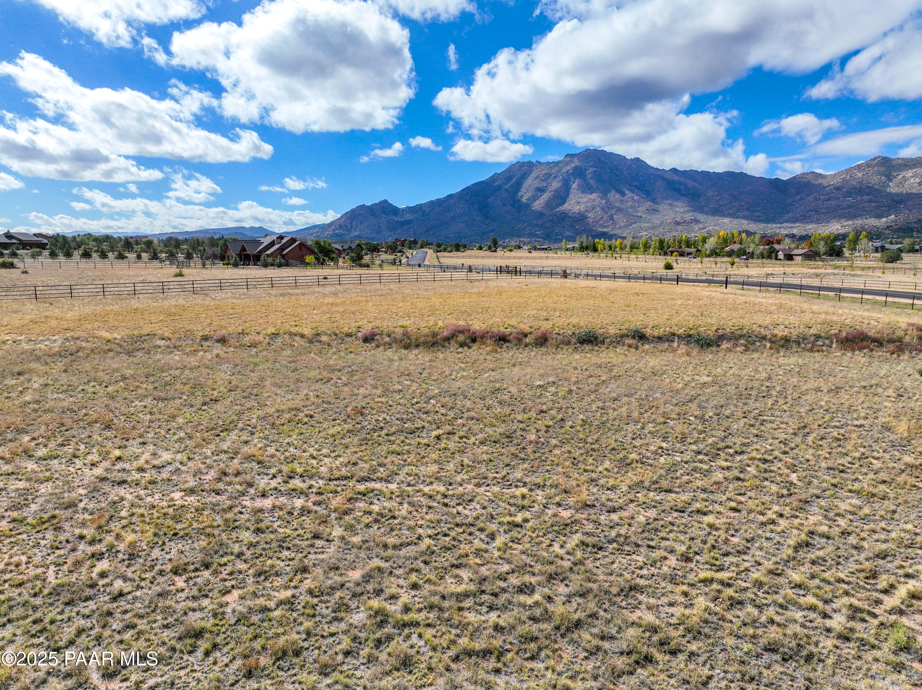 9875 North Equine Road Prescott, AZ 86305 - Photo 4 of 24 a view of an ocean with a building in the background