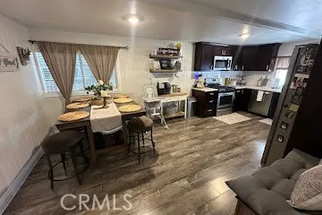 a bedroom with bed and a window