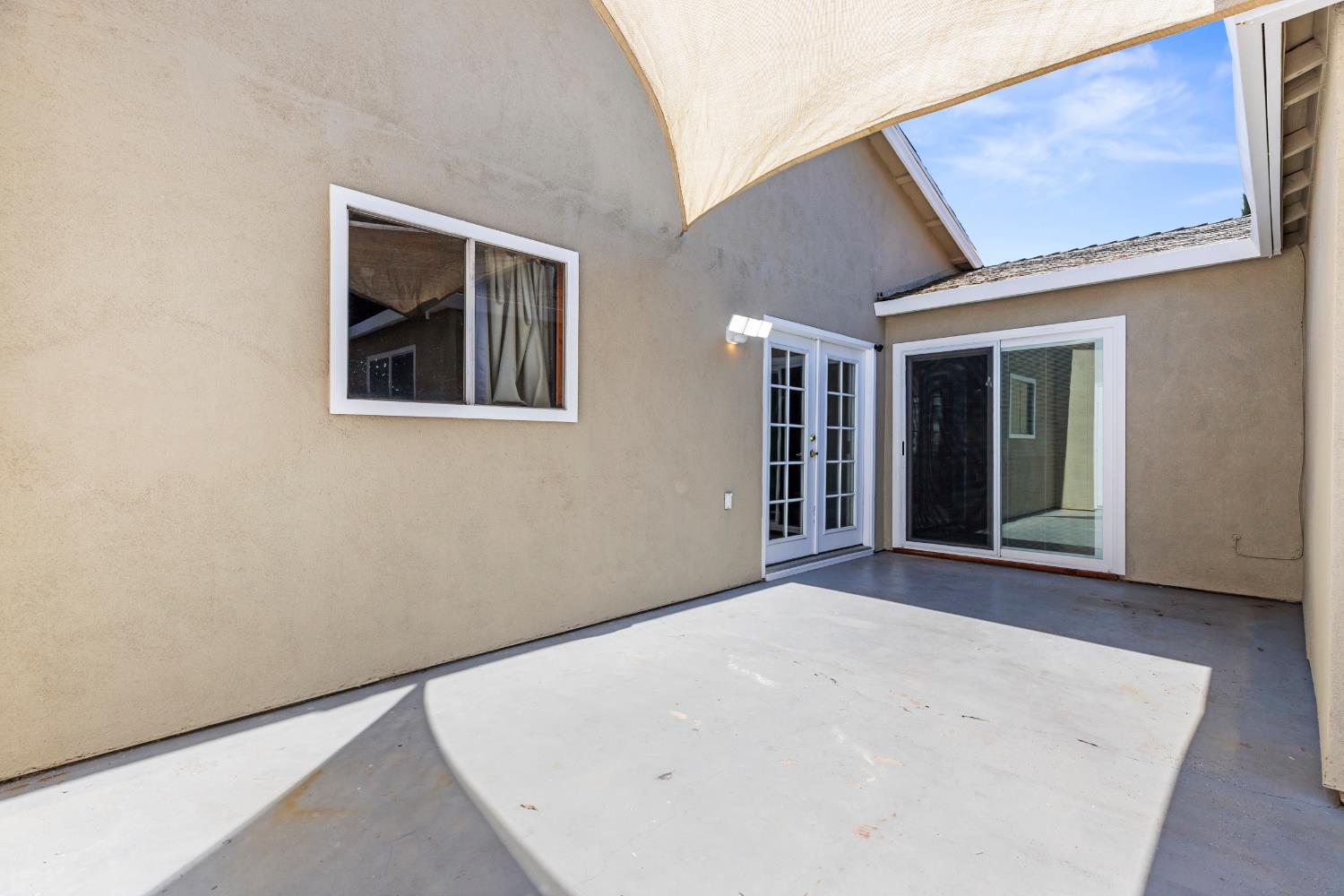 4005 Goldust Drive Modesto, CA 95355 - Photo 28 of 36 a view of an empty room with a window