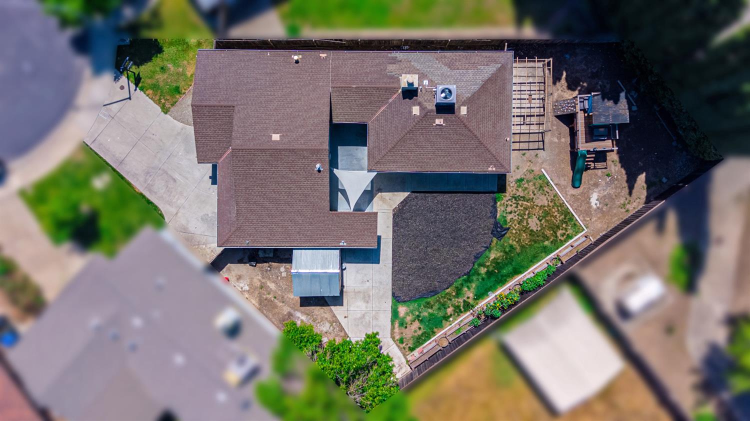 4005 Goldust Drive Modesto, CA 95355 - Photo 34 of 36 an aerial view of a house with a yard potted plants and large tree