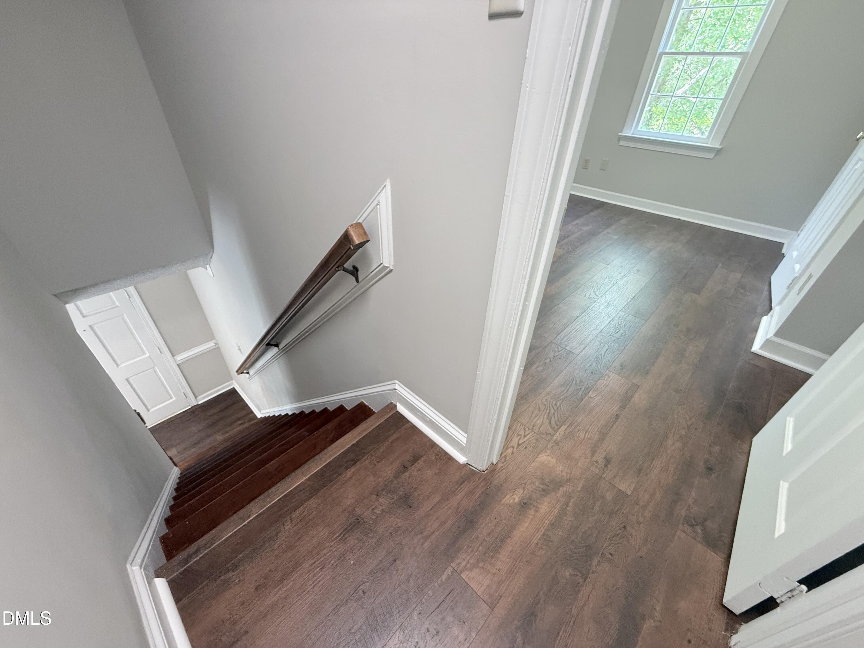 2900 Broadlands Drive Raleigh, NC 27604 - Photo 48 of 60 wooden floor in an empty room with a window