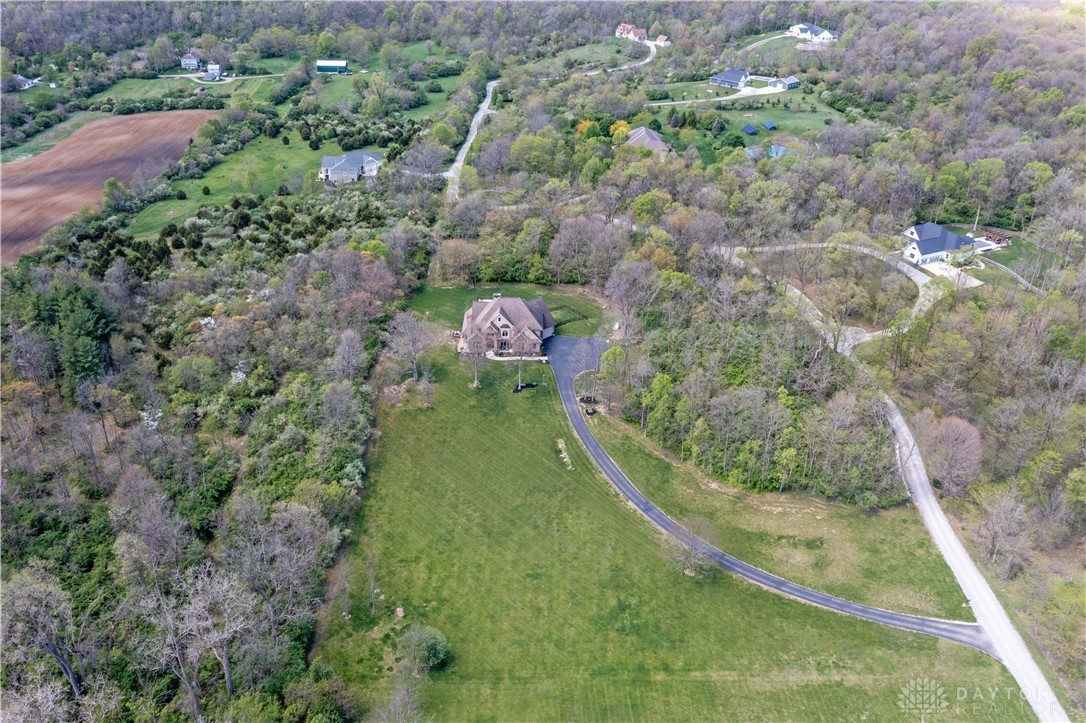 4096 Middle Urbana Road Urbana, OH 43078 - Photo 58 of 96 Perched atop a verdant landscape, this residence offers privacy and expansive natural surroundings.