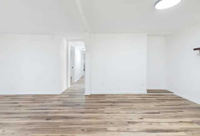a kitchen with a sink stove and microwave