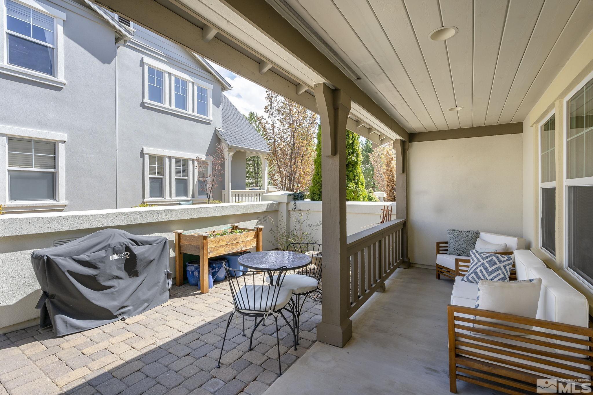 1618 Spring Hill Drive Reno, NV 89523 - Photo 18 of 25 a view of a patio with a table and chairs