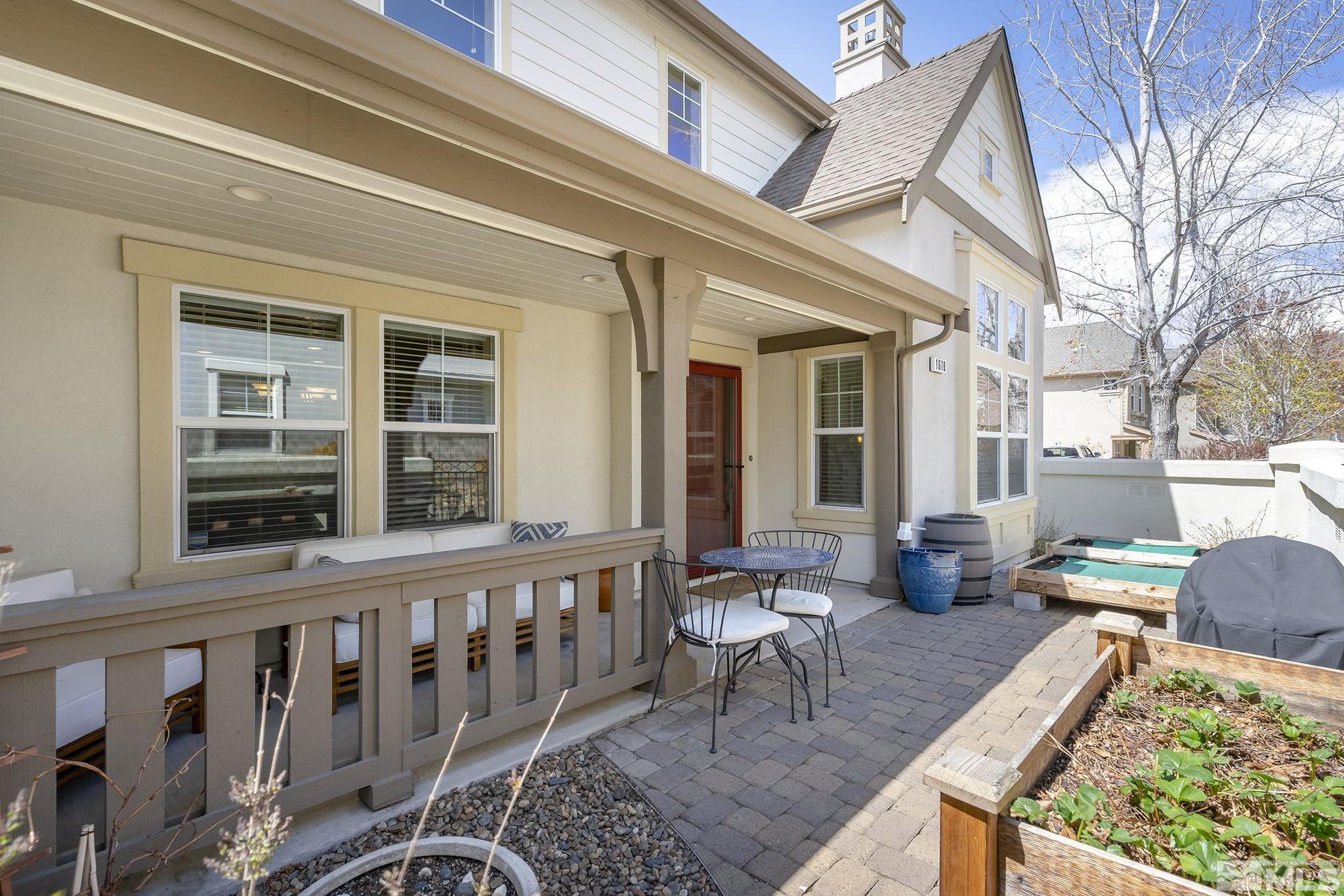 1618 Spring Hill Drive Reno, NV 89523 - Photo 22 of 25 a view of a patio with couches chairs and potted plants