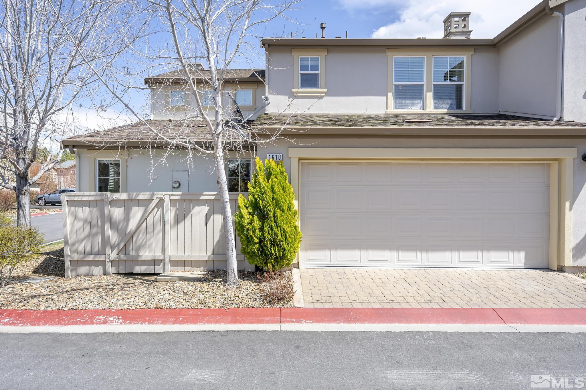 1618 Spring Hill Drive Reno, NV 89523 - Photo 25 of 25 a front view of a house with a yard