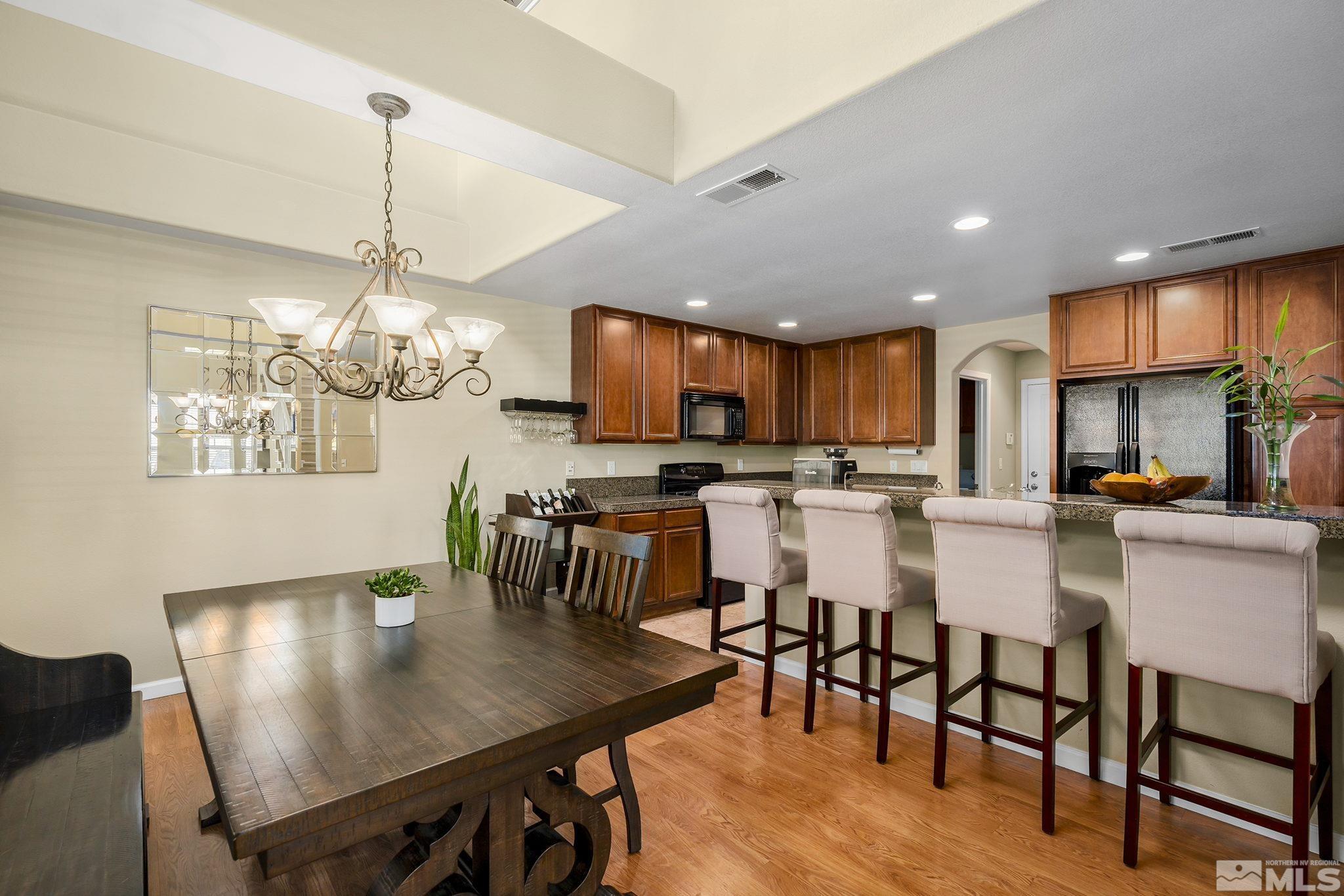 1618 Spring Hill Drive Reno, NV 89523 - Photo 5 of 25 a view of kitchen with dining table and chairs
