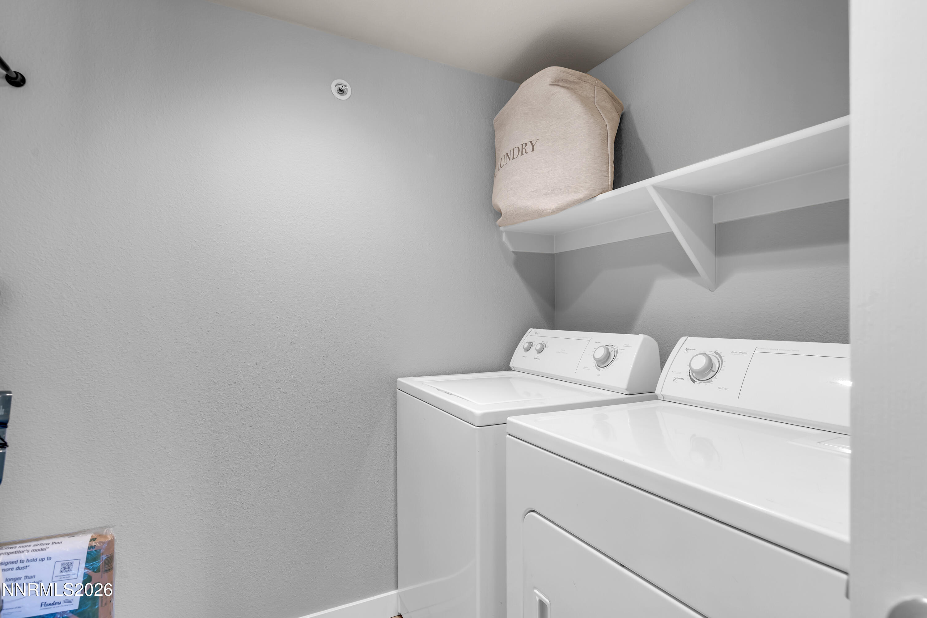 6850 Sharlands Avenue, Unit E 2022 Reno, NV 89523 - Photo 15 of 19 a view of washer and dryer