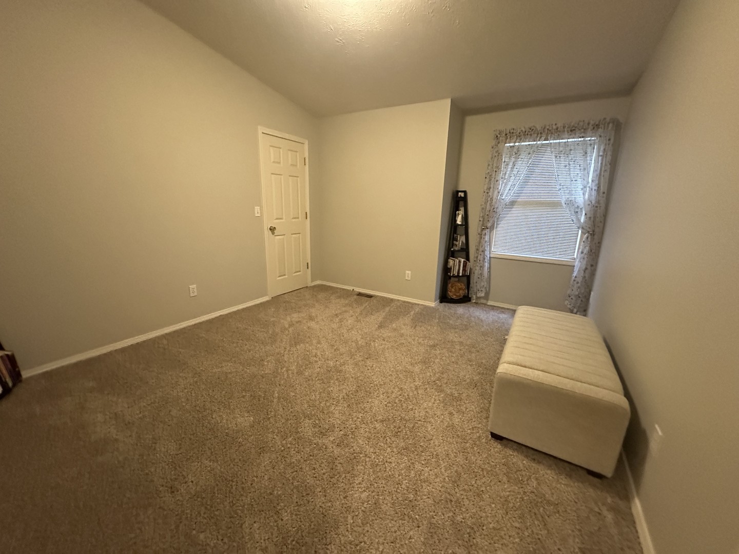 311 South Towanda Avenue, Unit 1 Normal, IL 61761 - Photo 14 of 19 a view of an empty room and window