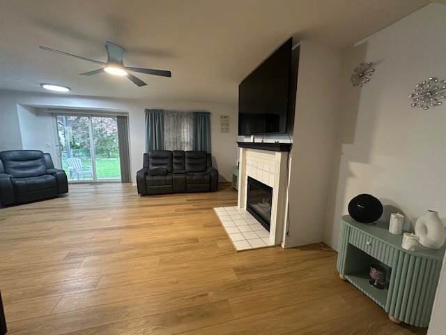 311 South Towanda Avenue, Unit 1 Normal, IL 61761 - Photo 2 of 19 a kitchen with furniture and flat screen tv