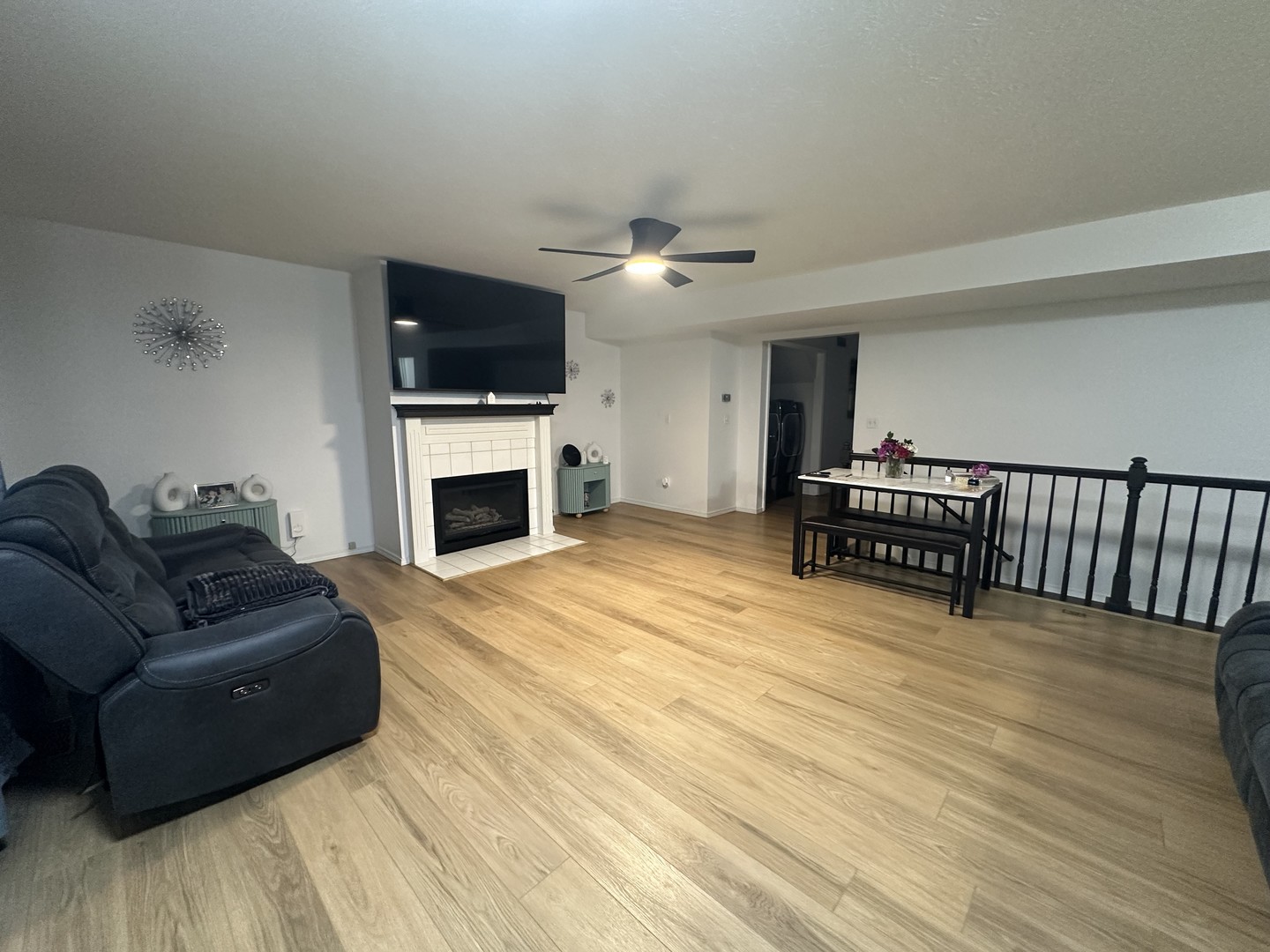 311 South Towanda Avenue, Unit 1 Normal, IL 61761 - Photo 3 of 19 a living room with furniture fireplace and flat screen tv