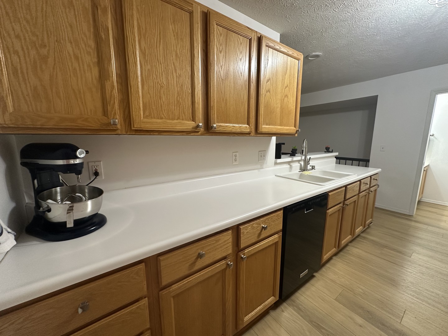 311 South Towanda Avenue, Unit 1 Normal, IL 61761 - Photo 9 of 19 a kitchen with a sink and cabinets