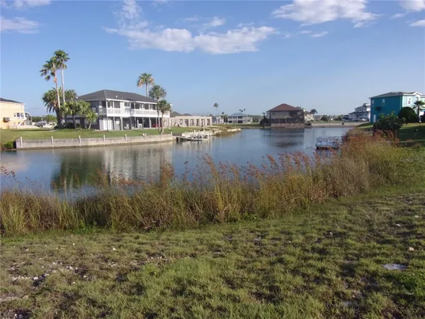 a view of a lake with houses