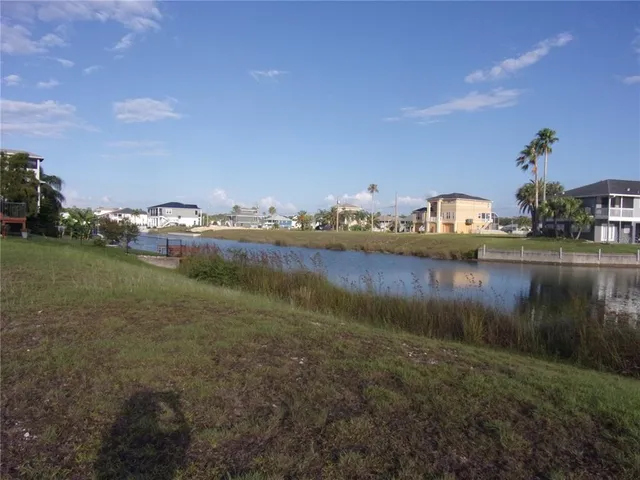 a view of a lake with houses