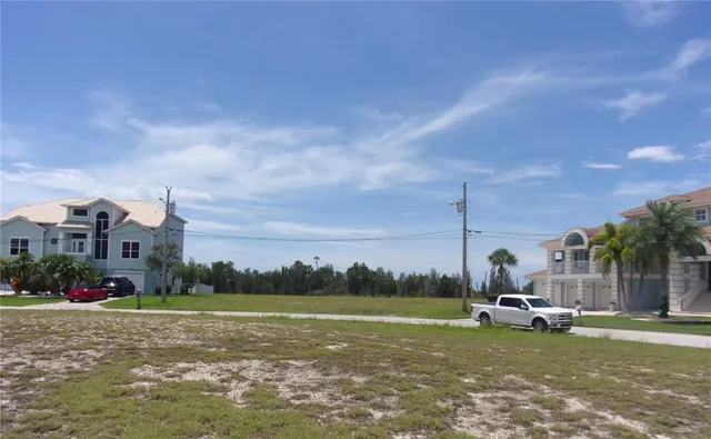 a view of a lake in front of the house