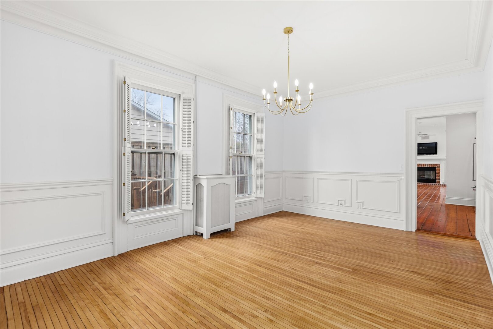 540 Pearl Street Ottawa, IL 61350 - Photo 12 of 70 a view of empty room with wooden floor and fan
