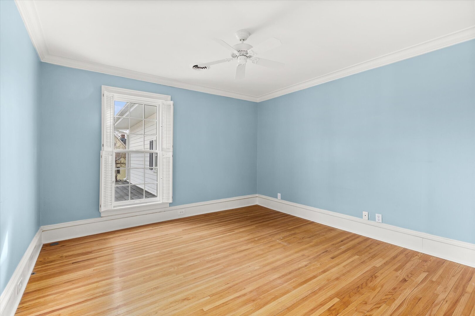 540 Pearl Street Ottawa, IL 61350 - Photo 51 of 70 a view of an empty room with wooden floor and a window