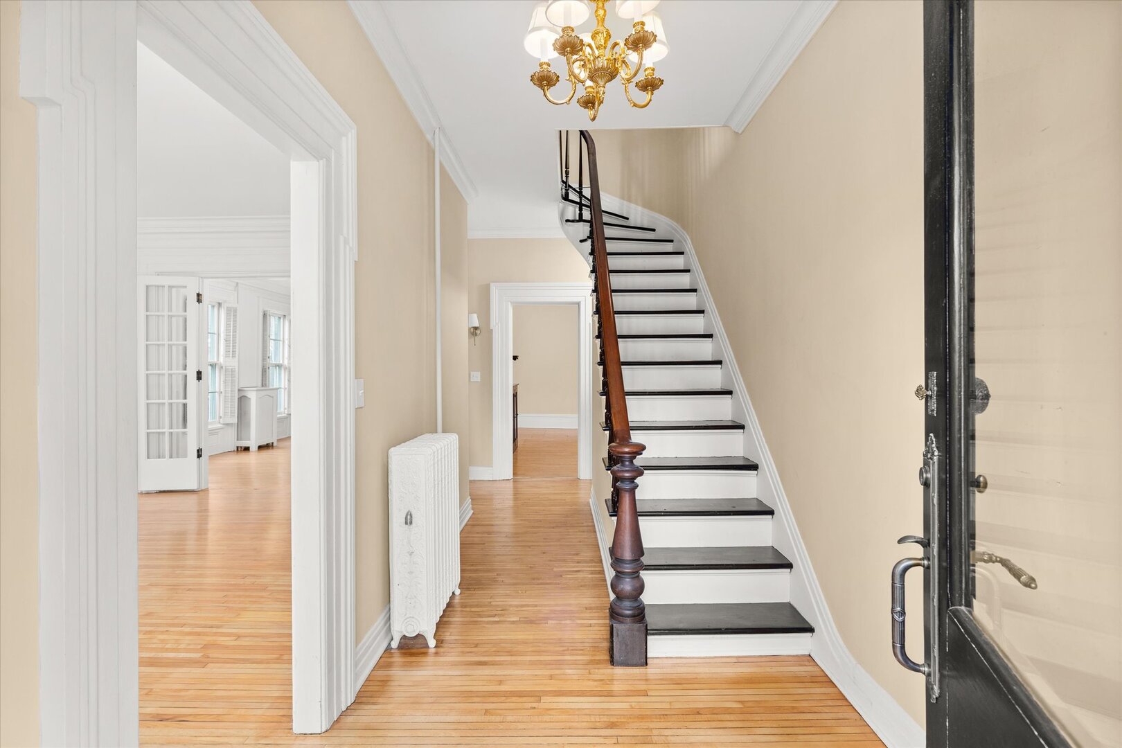 540 Pearl Street Ottawa, IL 61350 - Photo 7 of 70 a view of a hallway with wooden floor and staircase