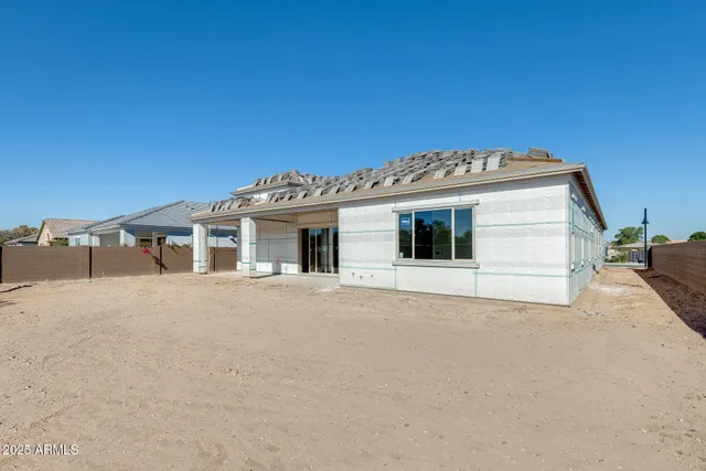 a view of a house with a large trees