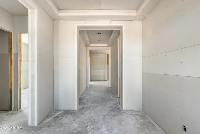 a view of a hallway with closet