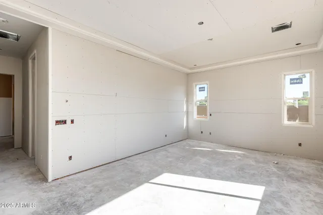 an empty room with windows