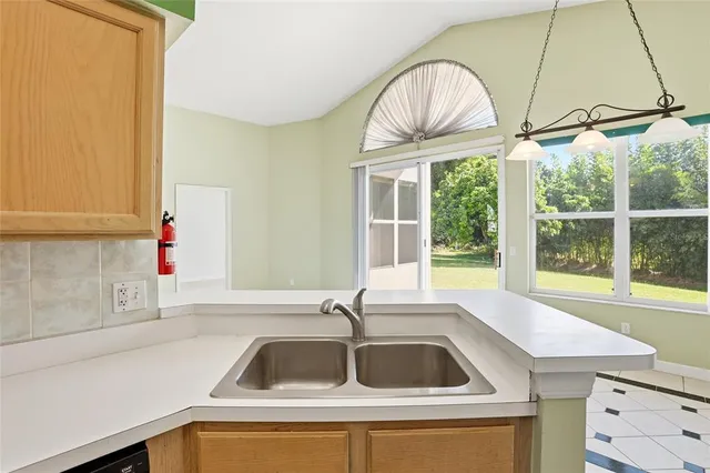a view of a storage and utility room with a window