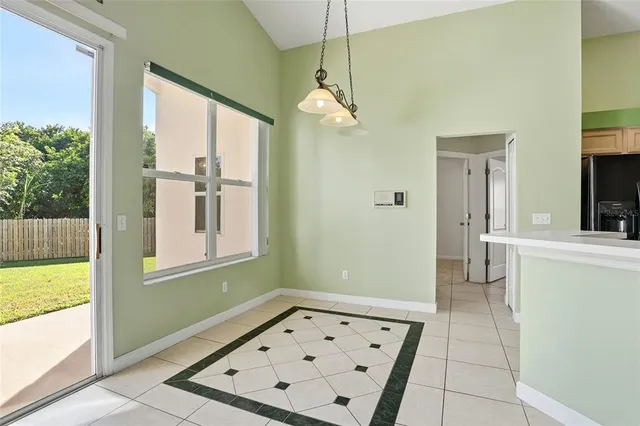 a view of a kitchen with a sink