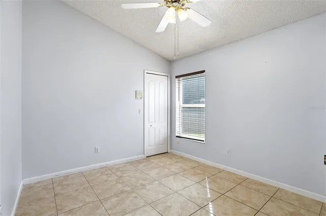 a bathroom with a sink and a mirror with toilet