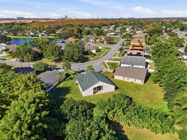 an aerial view of a house with a garden