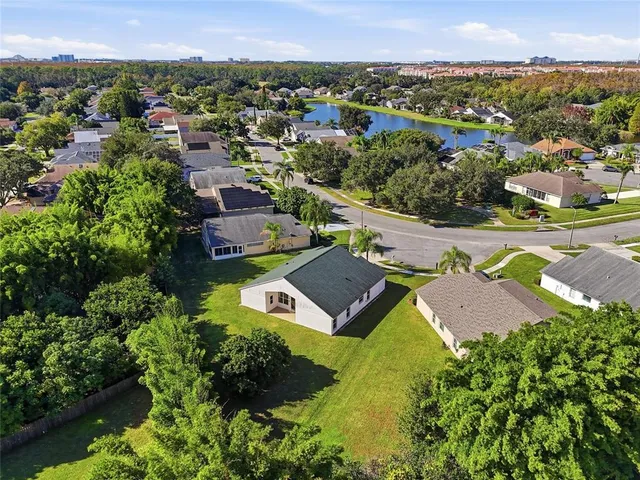 an aerial view of a house with a garden