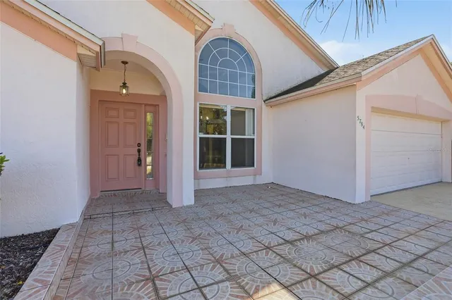 a view of entryway with a front door