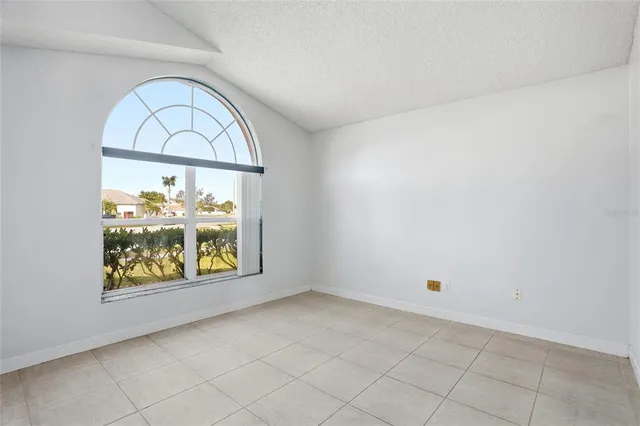 an empty room with window