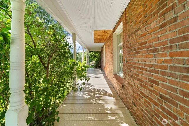 a view of a pathway both side of house