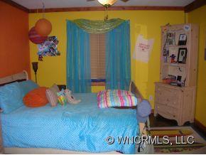 677 Big Island Road Forest City, NC 28043 - Photo 12 of 24 a room with toys and wooden floor