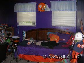 677 Big Island Road Forest City, NC 28043 - Photo 13 of 24 a living room with furniture and a fireplace