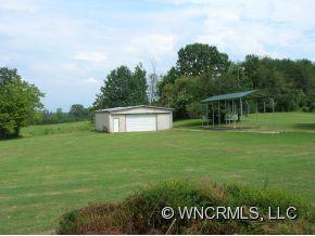 677 Big Island Road Forest City, NC 28043 - Photo 17 of 24 a view of a house with a yard