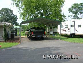 677 Big Island Road Forest City, NC 28043 - Photo 22 of 24 a view of a car parked in front of a house