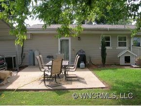 677 Big Island Road Forest City, NC 28043 - Photo 23 of 24 a view of a house with backyard and sitting area