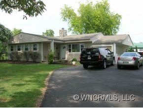 677 Big Island Road Forest City, NC 28043 - Photo 24 of 24 a car parked in front of a house