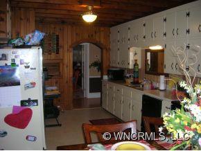 677 Big Island Road Forest City, NC 28043 - Photo 8 of 24 a kitchen with a refrigerator and a stove