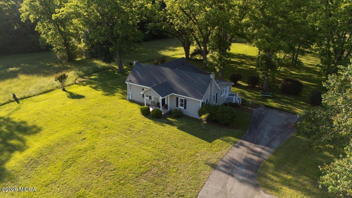 214 Howard Roberts Road Gray, GA 31032 - Photo 33 of 36 a view of a house with a yard