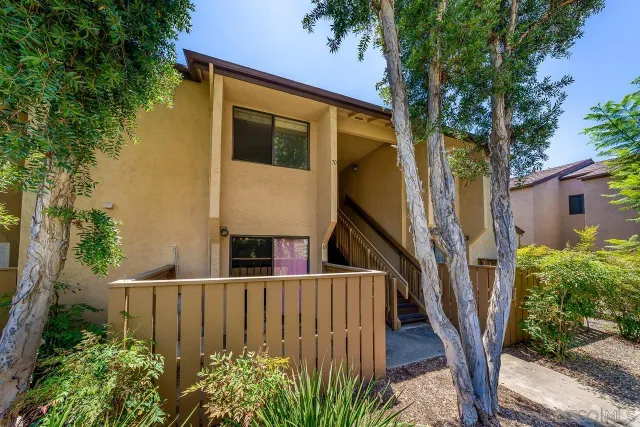 a view of a swimming pool with a lounge chair