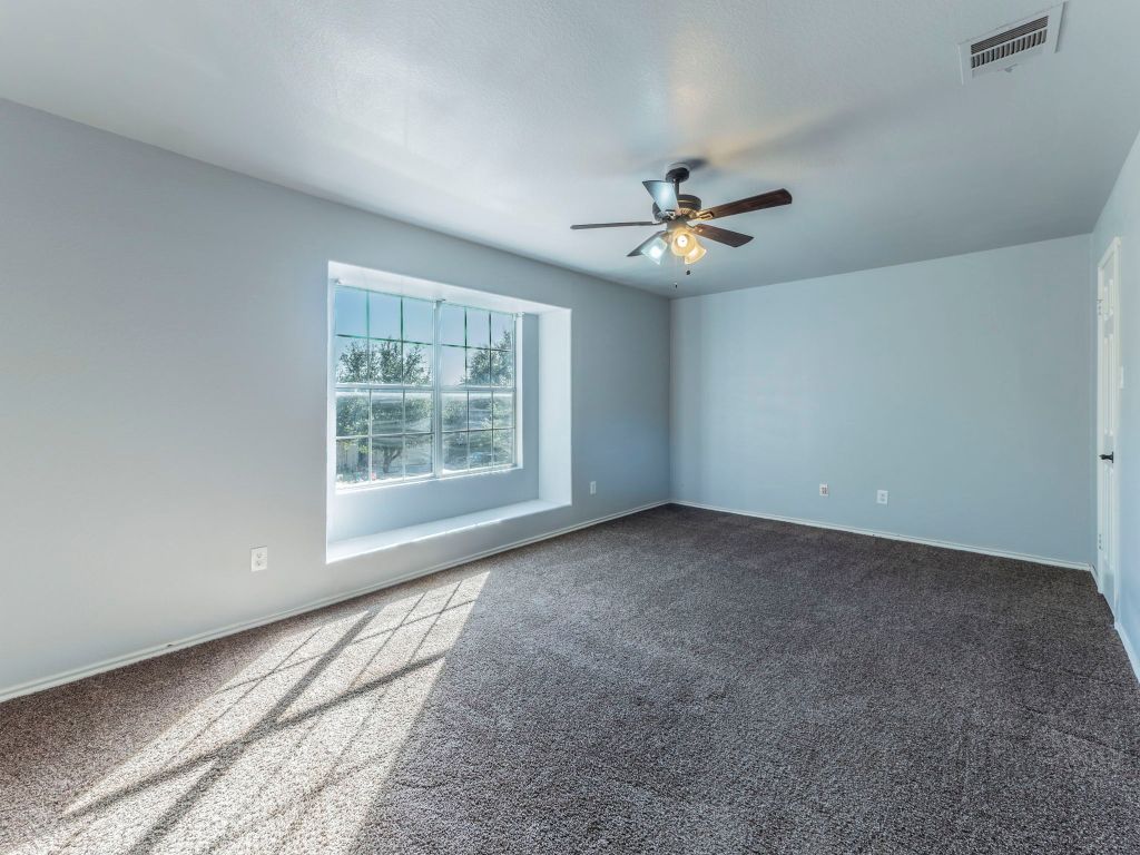 924 Satellite View Round Rock, TX 78665 - Photo 14 of 30 Front bedroom over garage