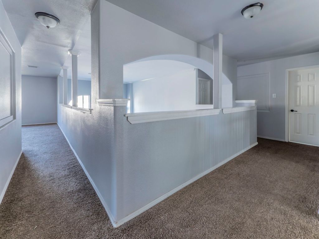 924 Satellite View Round Rock, TX 78665 - Photo 17 of 30 Corridor featuring carpet and baseboards