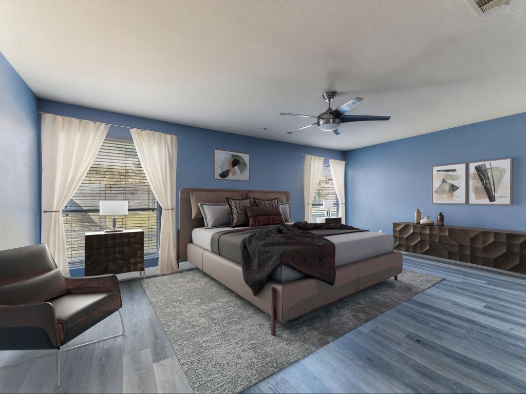 924 Satellite View Round Rock, TX 78665 - Photo 19 of 30 VIRTUALLY STAGED master Bedroom virtual staged featuring grey wood finished floors and a ceiling fan